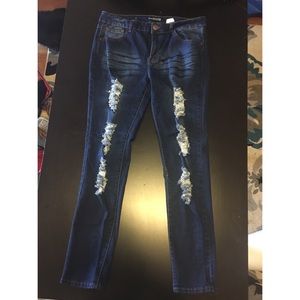 Plus size distressed jeans